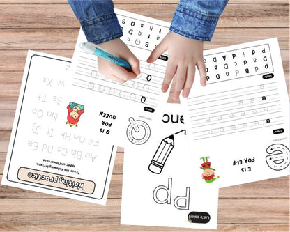 Children's hands working on alphabet worksheets with a pen on a wooden surface.