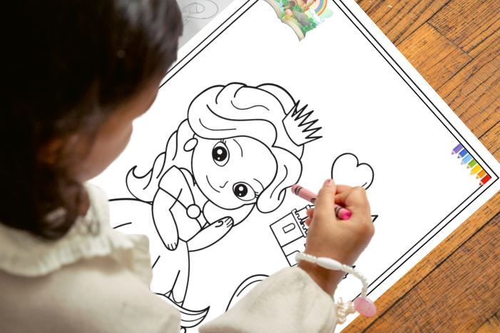 Child coloring a picture of a cartoon character on a coloring book page.